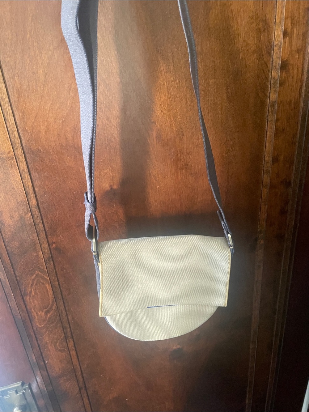 Rothy's Light Yellow Crossbody Saddle Bag with Dark Adjustable Strap